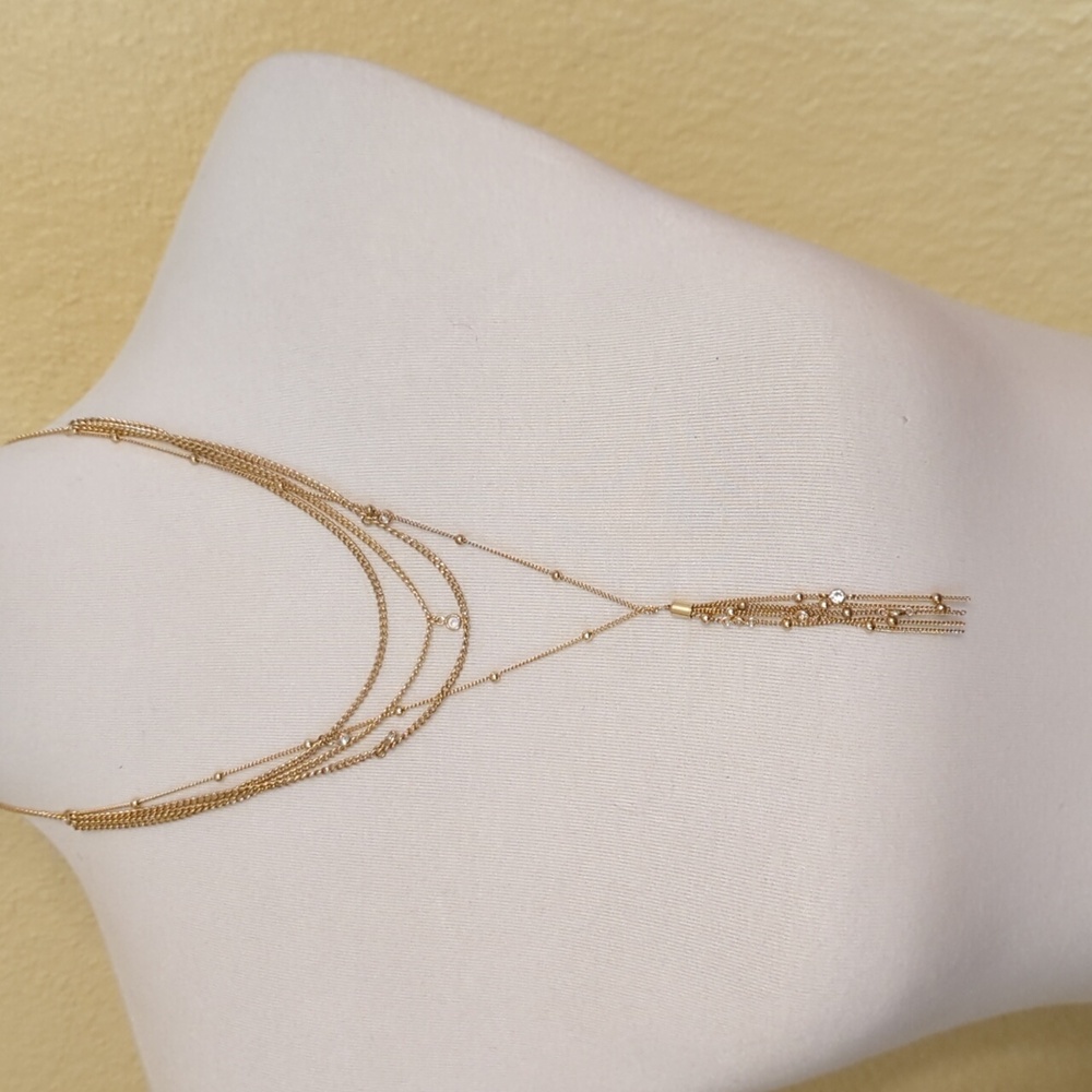 Gold tone multi layer necklace